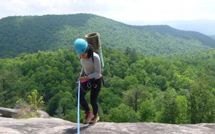 young adults rock climbing camp